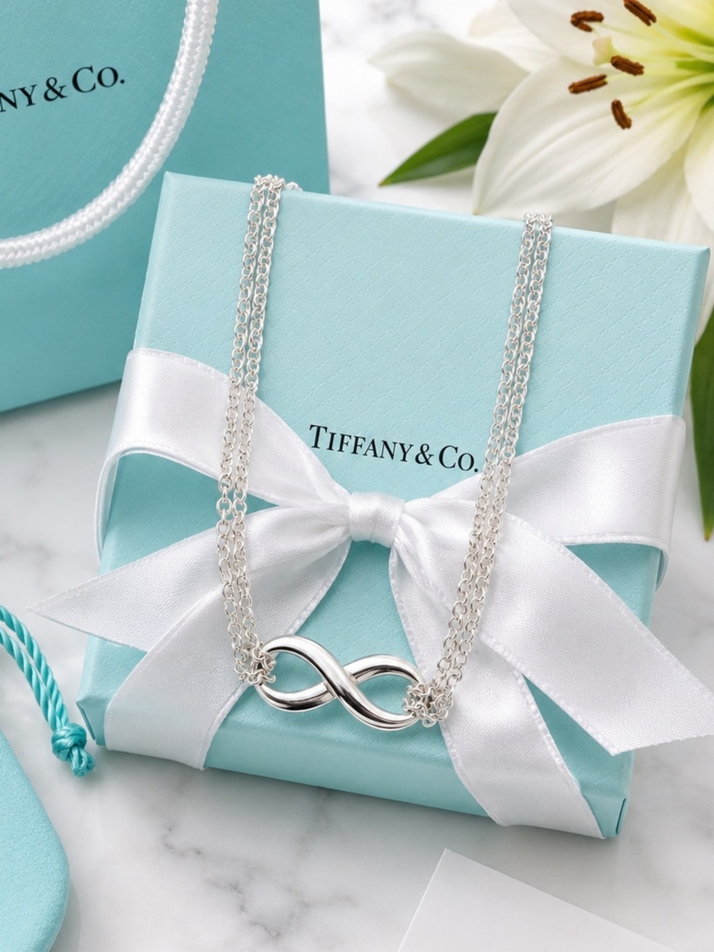Authenticated Tiffany & Co. Sterling Silver Infinity Pendant Necklace 15.5”